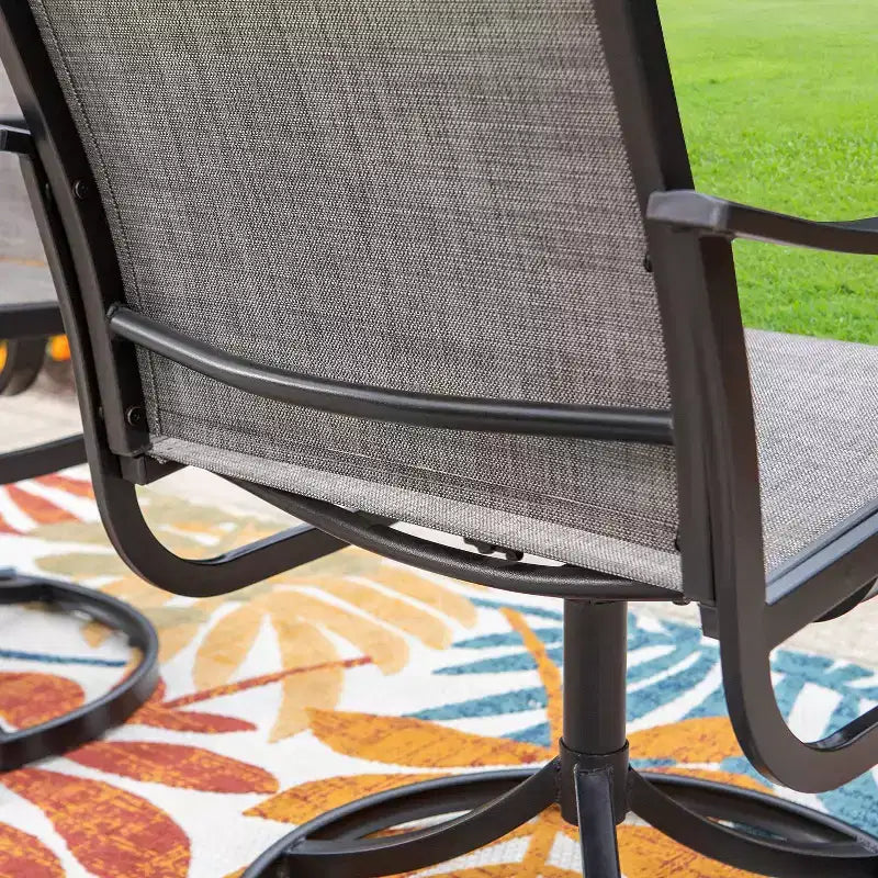 Ensemble de salle à manger d'extérieur 7 pièces Captiva Designs avec table rectangulaire avec trou pour parasol de 4 cm et chaises à accoudoirs en métal.