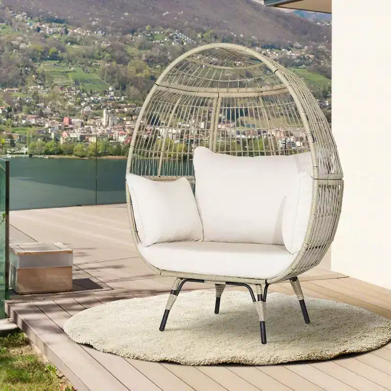Fauteuil œuf surdimensionné en rotin Costway avec 4 coussins pour l'intérieur et l'extérieur