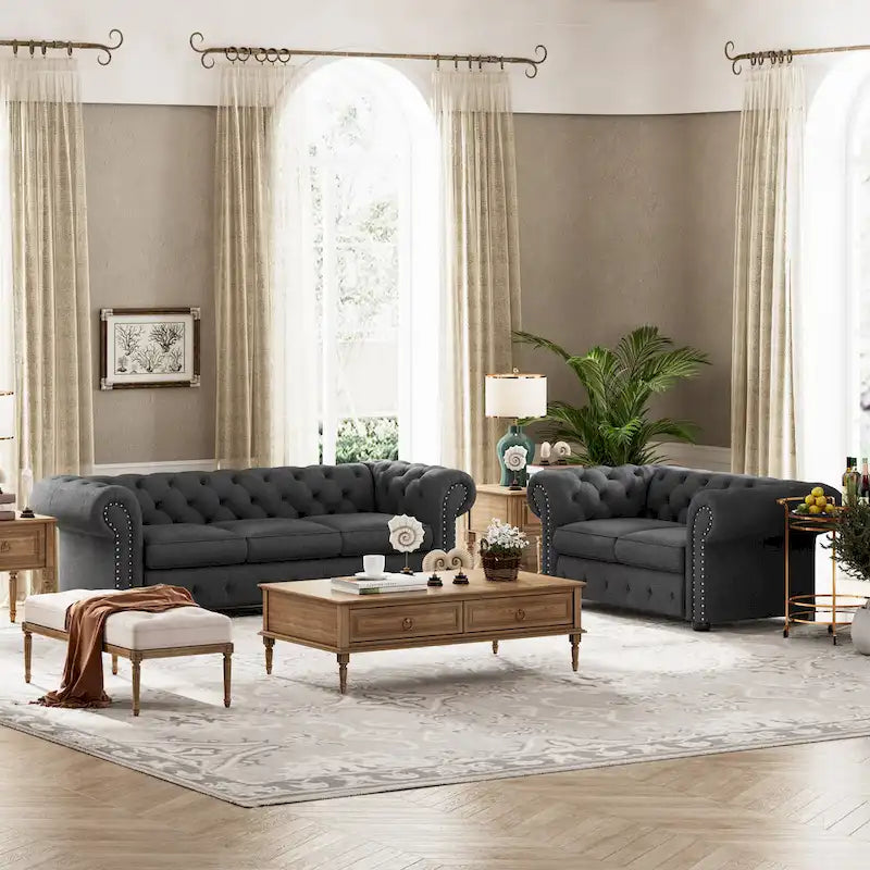 Ensemble canapé et causeuse chesterfield 2 pièces à accoudoirs roulés et capitonnés Corvus Aleksis