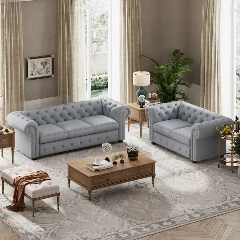 Ensemble canapé et causeuse chesterfield 2 pièces à accoudoirs roulés et capitonnés Corvus Aleksis