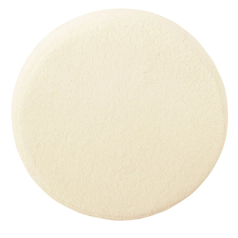 Pouf rond tapissé sur le dessus avec structure en métal - Fausse peau de mouton crème