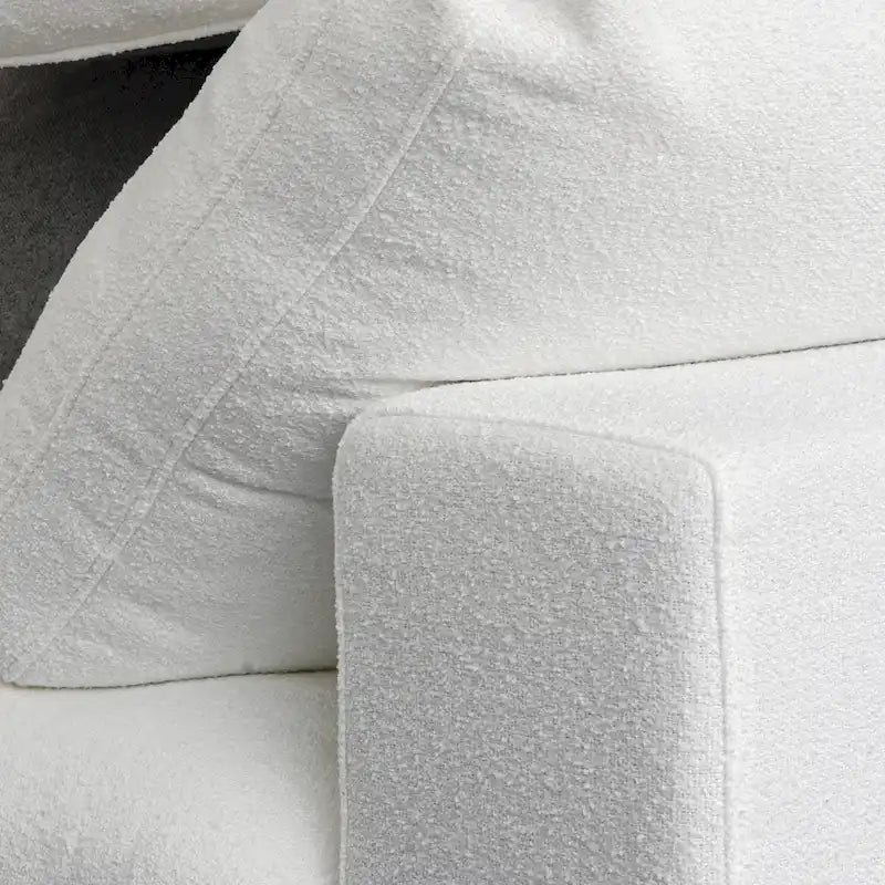 Canapé d'angle modulable 4 places en duvet Commix avec pouf de rangement