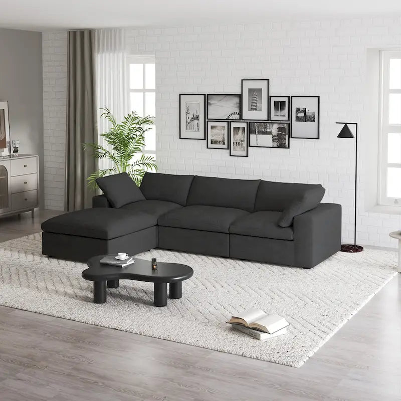 Canapé d'angle modulable 4 places en duvet Commix avec pouf de rangement