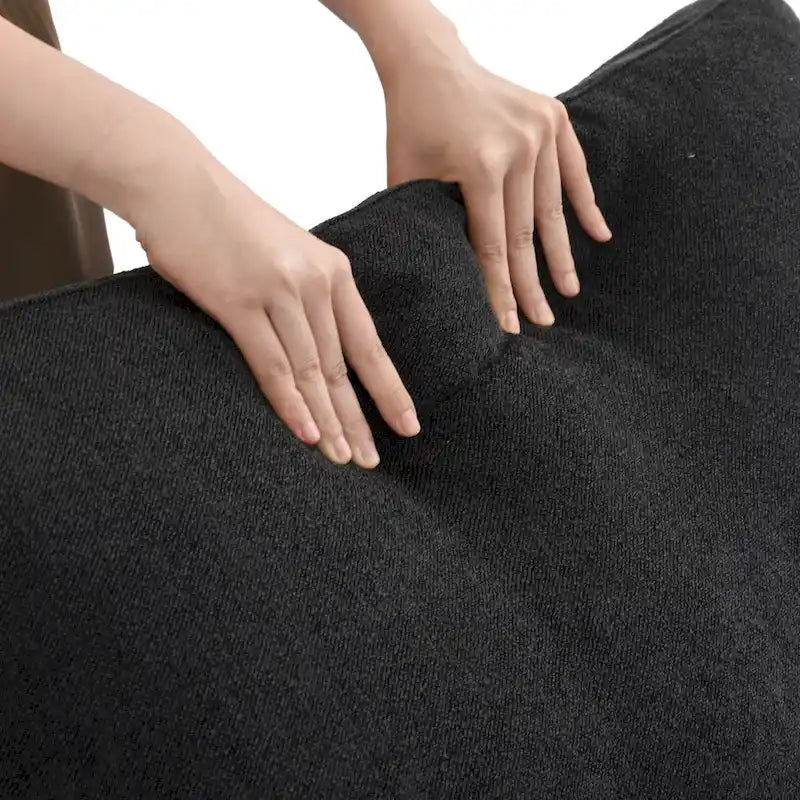 Canapé d'angle modulable 4 places en duvet Commix avec pouf de rangement