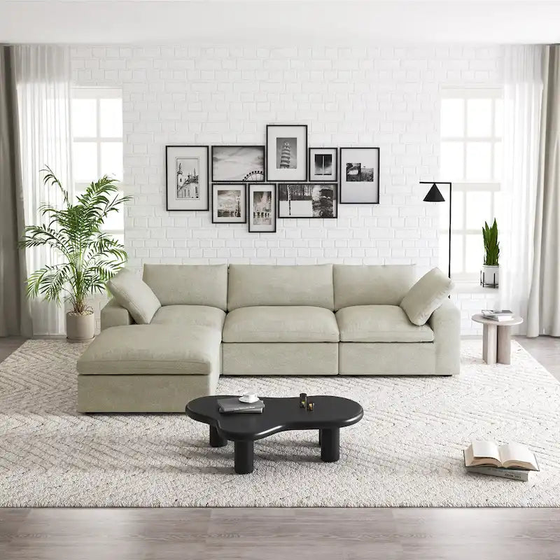 Canapé d'angle modulable 4 places en duvet Commix avec pouf de rangement