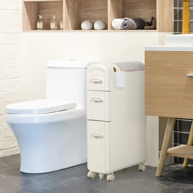 Meuble de rangement pour papier toilette à côté des toilettes pour petite salle de bain