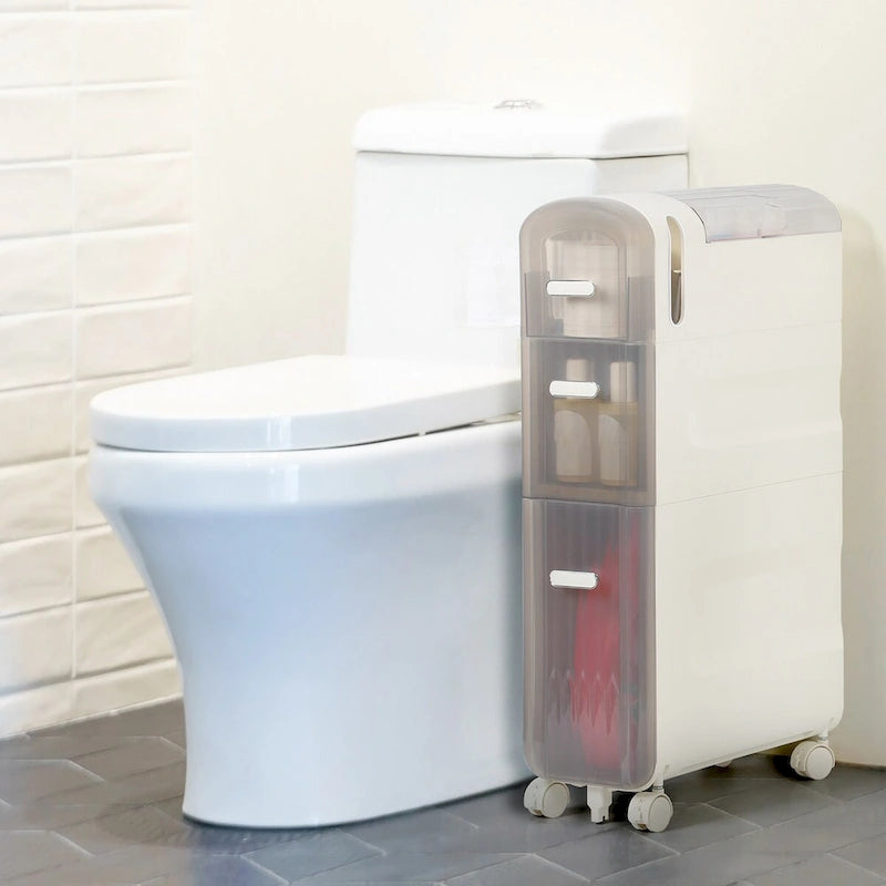 Meuble de rangement pour papier toilette à côté des toilettes pour petite salle de bain