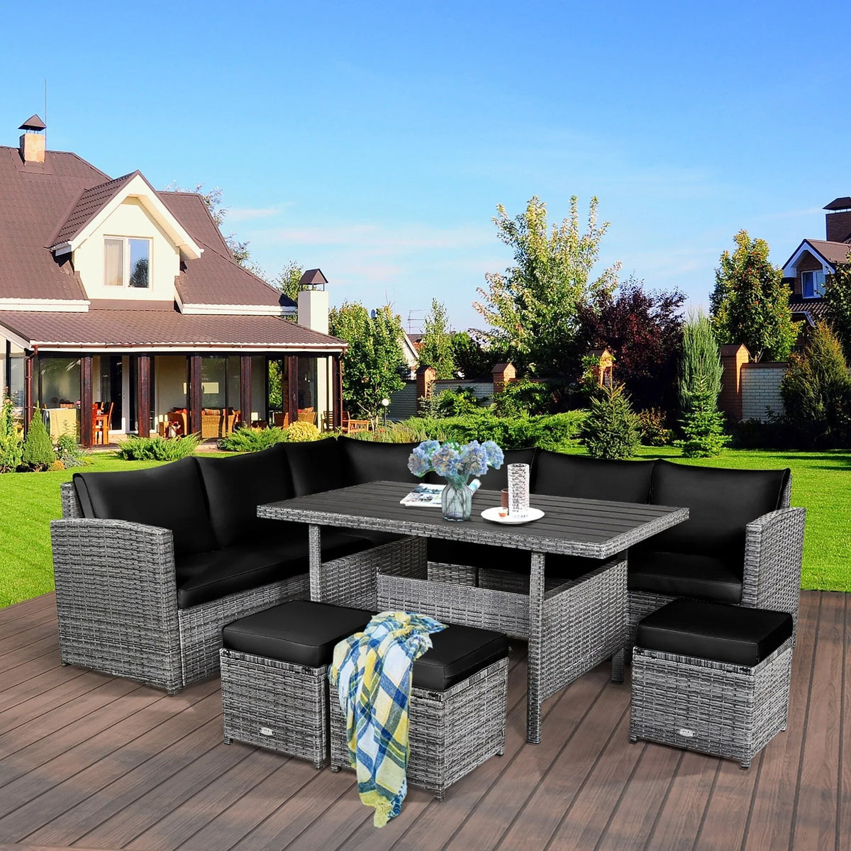 Ensemble de salle à manger Costway 7 pièces en rotin pour terrasse, canapé sectionnel et pouf - Voir détails