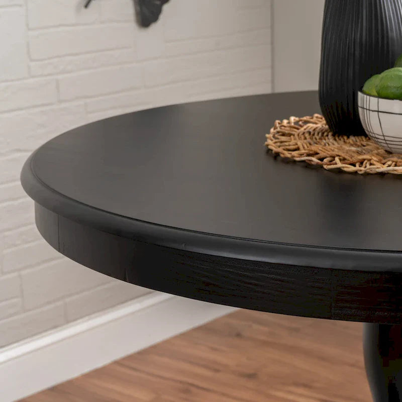 Table ronde à pied central en bois massif